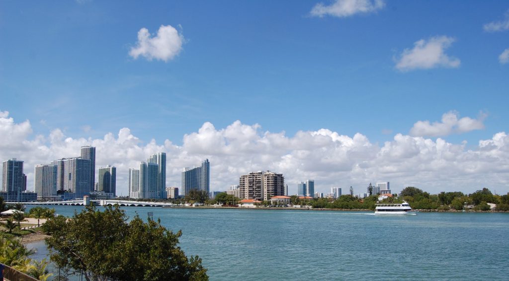 A city of towers along the far shore of a wide bay