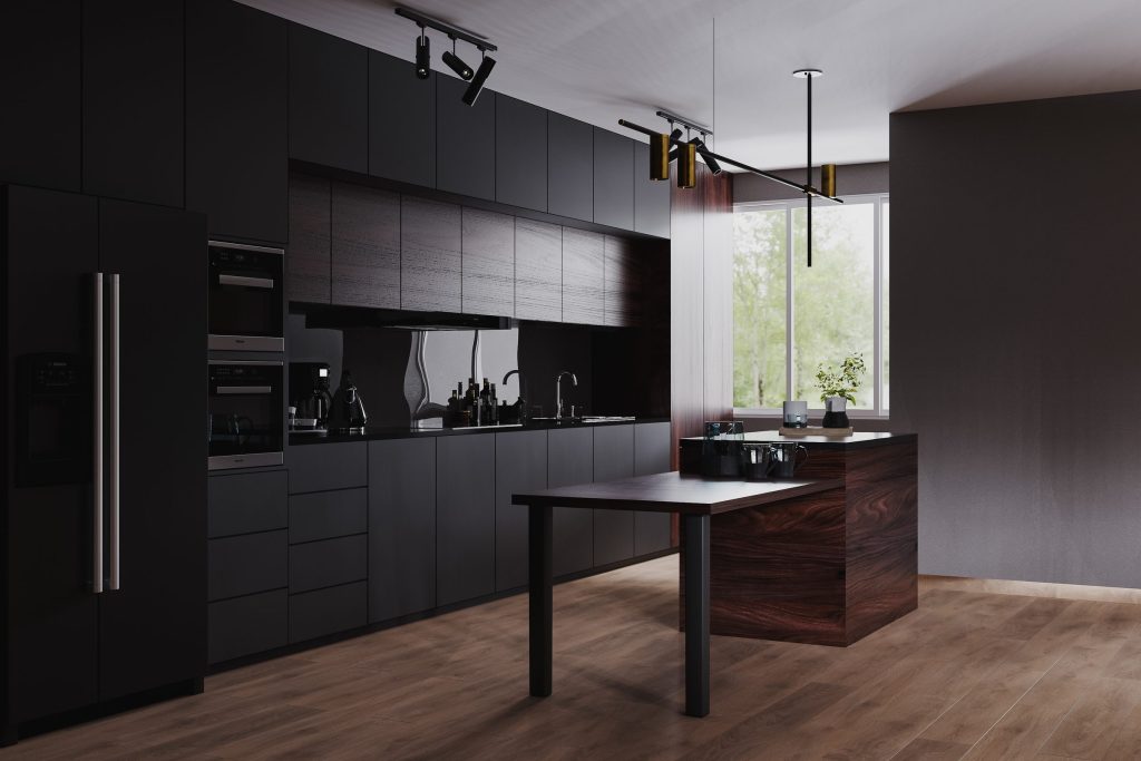 A black kitchen along one wall with a column of built-in appliances and a walnut island
