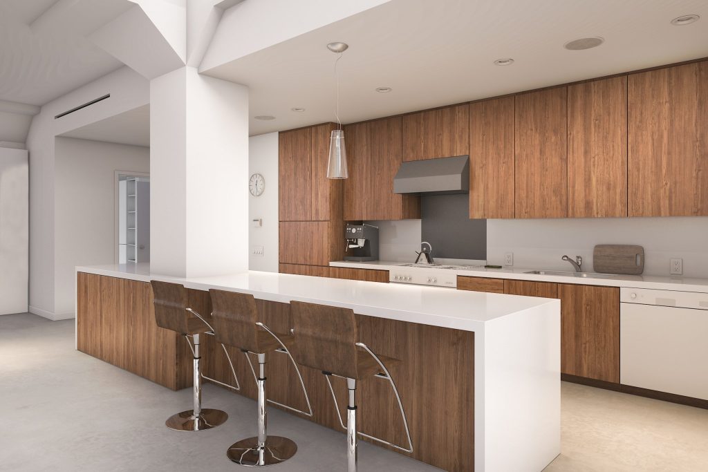 A walnut kitchen with a long white island and three stools, a stainless hood over the range and a coffee machine on the counter.
